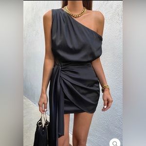 Sexy mini black dress.Worn only 1 Times!like brand new